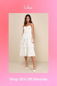 You'll have everyone wrapped around your finger in the Lulus Com-pleat-ly Charming Ivory Organza Tiered Strapless Midi Dress! Airy woven organza, with a stunning sheen throughout, shapes a pleated, strapless bustier-style bodice with hidden no-slip strips, lightly padded cups, and supportive underwire and side boning. Fitted waist tops a tiered skirt that ends at a midi hem. Hidden zipper/clasp at back. Fit: This garment fits true to size. Length: Mid-calf length. Size medium measures 40" from t Strapless White Organza Dress, Tiered Strapless Dress For Summer Wedding, Spring Wedding Strapless Organza Dress, Chic White Organza Midi Dress, Chic Organza Dress With Sweetheart Neckline, White Organza Midi Dress For Evening, White Silk Dress With Sweetheart Neckline, White Organza Midi Dress For Wedding, Feminine Strapless Midi Dress For Casual Occasions