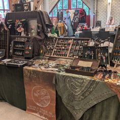 an assortment of jewelry on display in a store