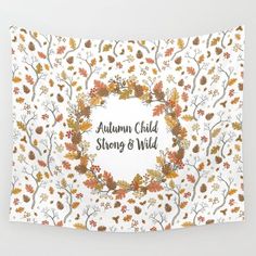 an autumn themed wall hanging with leaves and branches in the center that says, autumn child strong & wild