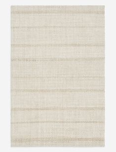 a beige rug with some lines on it