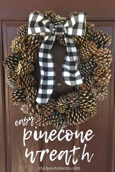 a pinecone wreath with the words, enjoy pinecone breath on it