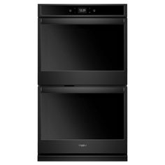 two black ovens side by side on a white background