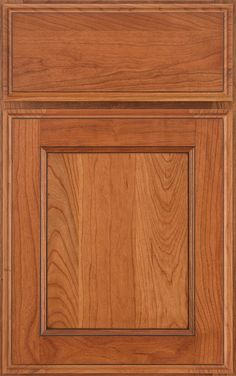 a wooden cabinet door with square and rectangle design