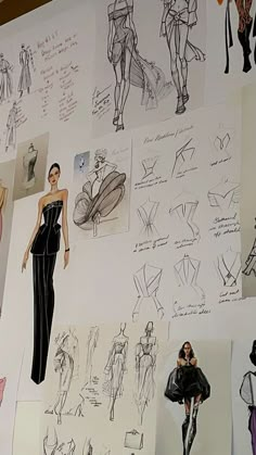 a wall covered in drawings and sketches of women's dresses