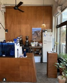 the kitchen is clean and ready to be used as a coffee shop or office space