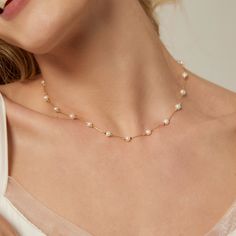 Each piece of our pearl jewelry is meticulously handmade, embodying sincerity and love. So you can use it as anniversary gift, birthday gift, wedding gift, bridesmaid gift, Christmas gift, or a simple token of appreciation for your mother, wife, girlfriend, or friend, our jewelry is designed to convey your deepest emotions❤️❤️ ⭐️DIMENSIONS -Pearl Size:4-5 mm -Bracelet Length:15+5 cm -Necklace Length:45+5 cm ⭐MATERIAL -Natural Freshwater Pearls -14K Gold Plated ⭐PACKAGING: GIFT BOX: All pearl jew Pearl Clavicle Chain Jewelry With Round Beads, Pearl Clavicle Chain With Round Beads, Gold Single Strand Pearl Necklace For Wedding, Dainty Pearl Jewelry With Pearl Charm, Dainty Pearl Charm Jewelry, Dainty Pearl Bracelet With Pendant, Pearl White Pearl Clavicle Chain Jewelry, Wedding Jewelry With Clavicle Chain And Round Beads, Dainty Pearl White Wedding Pearl Bracelet