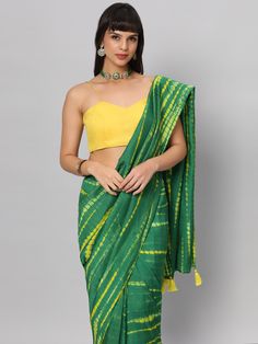 This light weight Green Tie dye saree is a versatile saree that is a must have in your wardrobe. This saree is extremely light weight will give you great pitures and can be worn for different ocassions. Team this saree up with Yellow raw silk blouse & statement earrings. Suitable for Poojas, Day function, brunhes, Wedding & haldi functions. Product Features: Saree Color: Green & yellow Blouse Color: Yellow Saree Fabric: Georgette silk Blouse Fabric: Raw Silk Saree Work: Tie Dye Print Wash Care: Green Zari Work Saree For Summer, Green Saree With Zari Work For Summer, Green Summer Saree With Zari Work, Green Wedding Saree For Summer, Summer Wedding Green Saree, Traditional Green Blouse Piece For Summer, Green Unstitched Blouse Piece For Summer, Unstitched Green Blouse Piece For Summer, Green Art Silk Blouse Piece For Diwali