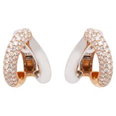 These wonderful earrings by Italian jeweller, Mattioli, feature a distinctive and elegant split half-hoop design, masterfully crafted from luxurious 18 carat rose and white gold. The rose gold half of each earring is beautifully inlaid with a dazzling array of fine quality round brilliant cut diamonds, weighing approximately 2.80ct combined, meticulously set in multiple rows, catching the light from every angle and creating a striking contrast to the high polish white gold half. Designed for pie Luxury White Hoop Earrings For Formal Occasions, Luxury White Hoop Earrings With Brilliant Cut, Luxury White Brilliant Cut Hoop Earrings, Luxury White Gold Huggie Earrings, Luxury Polished Finish Hoop Earrings, Luxury Polished Hoop Earrings, Luxury Diamond Huggie Earrings For Formal Occasions, Formal Rose Gold Huggie Earrings With Polished Finish, Luxury Rose Gold Diamond Earrings With Brilliant Cut