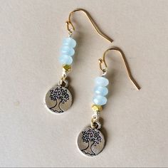 This Is New Handcrafted Earrings Silver Hammered Tree Of Life Light Blue Tone Aquamarine Gold Plated Beads Accent Gold Plated Ear Wire Hooks Approx 1.8” Total With Hooks, 10mm W Handmade In Us Please Review My Other Jewelry On Sale. Bundle Up And Save Even More. Fast Shipping Light Blue Metal Earrings As A Gift, Light Blue Metal Earrings For Gift, Nickel-free Blue Beaded Earrings As Gift, Nickel-free Blue Beaded Earrings For Gifts, Nickel Free Light Blue Beaded Earrings For Gift, Silver Beaded Earrings For Everyday, Nickel-free Light Blue Beaded Earrings Gift, Adjustable Silver Beaded Earrings For Everyday, Nickel Free Light Blue Metal Earrings