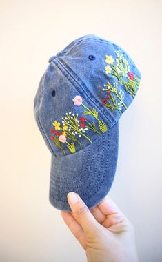 Hand embroidered vintage style hat, unstructured headband, with preformed visor, ventilation grommets. Adjustable with brass effect buckle. Color: Vintage Denim Design: Hand Embroidered flowers. Cap size (head circumference): 55-67cm; Fabric: 100% brushed washed cotton. Retro Visor Baseball Cap For Spring, Denim Curved Bill Hats For Spring, Retro Curved Brim Baseball Cap For Spring, Retro Spring Baseball Cap With Curved Brim, Vintage Cotton Baseball Cap For Summer, Retro Visor Hats For Spring, Retro Curved Bill Hats For Spring, Vintage Adjustable Baseball Cap For Spring, Denim Snapback Baseball Cap For Spring