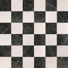 a black and white checkered marble tile pattern