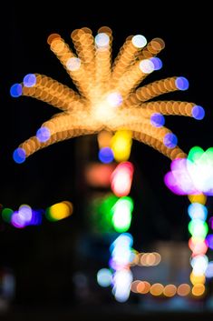 blurry photograph of fireworks in the night sky