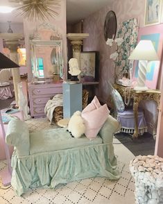 a dollhouse bedroom with furniture and accessories in it's display area, including a bed