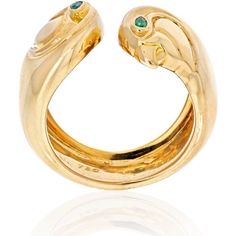 Transport yourself to the captivating world of fine jewelry with the Cartier 18K Yellow Gold Falcon Head Anoubois Ring! This extraordinary piece is a true vintage gem, hailing all the way from the glamorous streets of Paris in the 1980s. With its ancient Egyptian-inspired design, it exudes an air of mystique and allure that is bound to captivate your senses.Crafted with meticulous attention to detail, this ring showcases the exceptional craftsmanship that Cartier is renowned for. Fashioned in 18 Luxury Gold Ring With Jewels, Luxury Gold Rings With Jewels, Luxury Gold Emerald Open Ring, Cartier Luxury Gemstone Jewelry, Luxury Cartier Gemstone Jewelry, Elegant Cartier Jewelry, Cartier Gemstone Jewelry For Gifts, Luxury Formal Gemstone Snake Ring, Luxury Gemstone Snake Ring For Formal Occasions