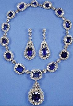 Art Deco Queen Elizabeth II moissanite and blue sapphire necklace earring  set a replica  in 925 sterling silver and moissanite for her Metal: Sterling Silver  Metal Purity:925 Necklace Metal weight: 87.99 gram Stone: moissanite  Stone Ctw:24.90ctw Gemstone: blue sapphire  Gemstone weight: 55.99 ctw Item length: 17 inch Earring: Metal: 925 sterling silver Metal weight: 8.90 cwt Stone: blue sapphire  weight: 8.00 cwt Stone: moissanite  Item Length: 2.00 inch Item Color: yellow gold plated Necklac British Crown Jewels, Royal Crown Jewels, Royal Jewellery, Blue Sapphire Necklace, Royal Tiaras, Blue Stones, George Vi, Royal Jewels, Jewellery Shop