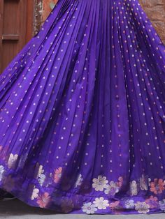 This stunning gown comes in a beautiful violet color with intricate zari weaving work, adding a touch of elegance and grace to your look.
Crafted from high-quality Banarasi silk, this fully stitched gown is available in sizes XS to XL, ensuring a perfect fit for every body type. The gown has a 4-meter flair and a length of 54 inches, offering a flowing and flattering silhouette.
Pair this violet gown with matching accessories and heels to complete your look and turn heads wherever you go.
This g Violet Gown, Engagement Gown, Lehenga Crop Top, Floral Lehenga, Lehenga Choli Wedding, Party Wear Lehenga Choli, Reception Gown, Bollywood Lehenga, Cocktail Wear