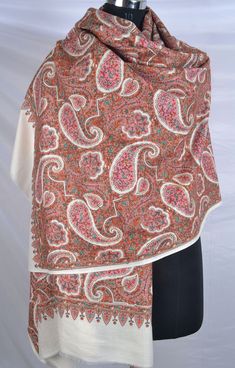 This Embroidered Pashmina Shawl is a luxurious and elegant accessory that can add a touch of sophistication to any outfit. The intricate paisley embroidery adds a beautiful and intricate detail to the shawl, making it a perfect accessory for formal events or even everyday wear. This embroidered pashmina shawl is a must-have accessory for anyone looking to add a touch of luxury and elegance to their wardrobe. The micro embroidery of this shawl mesmerizes the owner and any person wearing this shaw Bohemian White Dupatta With Zari Work, White Bohemian Dupatta With Zari Work, White Bohemian Embroidered Fabric For Eid, White Bohemian Shawl With Traditional Drape, White Jamawar Dupatta With Intricate Embroidery, Wedding Jamawar Embroidered Fabric, White Pashmina Shawl With Traditional Drape, White Pashmina Shawl In Traditional Drape, Beige Pashmina Shawl For Wedding With Traditional Drape