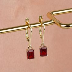 It is a stone that represents passion, true friendship,success and consistency. Our 14K solid gold and rectangular cut dangling garnet earring is suitable for daily use with its special design and is a stylish jewelery that you can use on your special days and gift it to your loved ones. A stylish jewel for you and your loved ones. Time to pamper yourself and your loved ones... Garnet is the birthstone for those born in January. 🤍🤍 Special gifts for your special moments. We produce our jeweler Elegant Gold Earrings With Rectangular Stone, Elegant Single Oblong Earring, Elegant Red Square Jewelry, Gold Rectangular Gemstone Earrings, Classic Gold Earrings With Rectangular Stone, Square Cut Jewelry With Matching Earrings For Gift, Elegant Oblong Jewelry With Ear Wire, Elegant Jewelry With Rectangular Pendant And Matching Earrings, Oblong Jewelry With Matching Earrings For Gifts