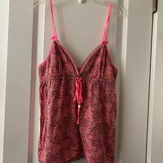 Juicy Couture Abstract Cami Top *New With Tags *Size Medium *Original Juicy Couture, Before It Was Revamped *Hot Pink Abstract Printed Cami Top *Grey Lace Trimmed Sweatheart Neckline And Waist *Adjustable Hot Pink Nylon Spaghetti Straps *Hot Pink Nylon Bow With Charms Detail On Front *Materials: Cotton, Modal, Elastane Pink Cami Tops For Beach, Pink Camisole Top For Beach, Pink Camisole Top For The Beach, Pink Camisole Top For Day Out, Pink V-neck Top For Vacation, Pink Tops For Beach Season, Trendy Pink Tops For The Beach, Pink Sleeveless Top For Loungewear, Pink Casual Cami Top