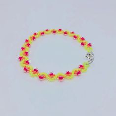 Lemon Twist Bracelet Size 7.48” Length; .25” Width Woven Several Times For Strength & Durability. Adjustable Yellow Bracelets For Party, Party Bracelets With Colorful Beads In Yellow, Neon Beaded Bracelets Gift, Neon Beaded Bracelet Gift, Yellow Jubilee Bracelet As Gift, Adjustable Yellow Bracelets For Gifts, Adjustable Yellow Bracelets As Gift, Adjustable Yellow Beaded Bracelet For Parties, Yellow Bracelet Jewelry For Gift