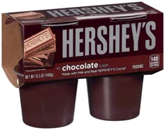 two boxes of hershey's chocolate sitting on top of each other in front of a red background