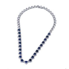 This elegant necklace features a beautiful lab-created sapphire. The necklace is designed to enhance any outfit and is sure to be a timeless addition to your jewelry collection. Features The necklace in sterling silver has a classic and luxurious design that is perfect for any occasion. Made all by hand! It truly deserves a spot in every jewelry collection. Beautifully crafted, this style is sure to become a treasured keepsake. It is made of 925 sterling silver. Made to last a lifetime, strong a Luxury Sapphire Necklace For Formal Occasions, Formal Round Sapphire Necklaces, Luxury Sapphire Necklace With Brilliant Cut, Luxury Heart-shaped Sapphire Jewelry, Elegant Blue Heart Necklace, Heart-shaped Sapphire Jewelry For Formal Occasions, Elegant Blue Jewelry With Bezel Setting, Classic Sapphire Diamond Necklace For Formal Occasions, Classic Sapphire Diamond Necklace With Brilliant Cut