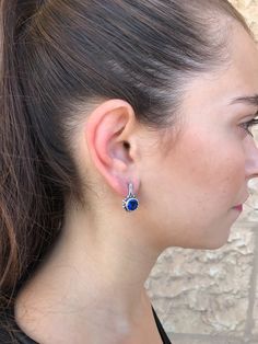 Vintage Earrings set with Natural Kyanite - Blue Kyanite sourced at the highest grade from Africa, in a deep blue color, at 8mm diameter. Flower Earrings design made of Solid 925 Sterling Silver ☞ made to last. Matching Ring: www.etsy.com/uk/listing/262723036 ⌛ Last pair of earrings left ⌛ For Pierced Ears - has a pin that goes into the ear and a leaver that securely closes on the pin behind the earlobes - " English Lock “ ❀ Each Natural Gem is unique & will have Slight variations from the produ Elegant Blue Round Cut Earrings, Blue Drop Earrings With Prong Setting, Blue Teardrop Earrings With Prong Setting, Classic Blue Earrings As Gift, Blue Round Earrings For Formal Occasions, Elegant Blue Round Earrings, Formal Blue Round Earrings, Blue Gemstone Crystal Earrings, Blue Round Cluster Earrings For Formal Occasions