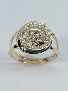 This stunning Sun/Moon ring has been carefully crafted in warm 10k yellow gold. This ring will make a great any occasion gift/birthday/Christmas gift. This delicate ring will not go unnoticed. All of my jewelry is handmade from scratch one item at a time. A tracking shipping number will be provided to you once the ring has been mailed.  Ring Measurements and Materials: Ring is size 7 1/2 but can be resized at no extra cost and will be shipped to you in an elegant gift box. Ring Weight: 3.5 grams 14k Gold Moon Shaped Ring For Gift, Gold Crescent Ring With Sun And Moon Design, Moon Shaped 14k Yellow Gold Rings, 14k Yellow Gold Moon Phase Rings, 14k Yellow Gold Rings With Moon Phase, 14k Yellow Gold Rings With Moon Phase Detail, Gold Moon Shaped 14k Gold Ring, Moon Shaped 14k Gold Ring, Gold Moon-shaped 14k Gold Ring