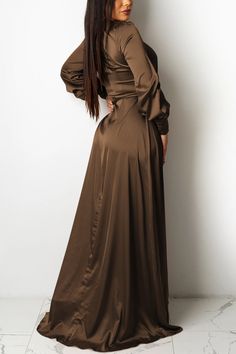 Envelop yourself in luxury with our In Love V-Neck Satin Maxi Wrap Dress. Its sleek, figure-flattering silhouette and soft, satin fabric will make you feel like a goddess. The deep V-neckline adds a touch of sensuality, making it the perfect choice for any special occasion. Elevate your wardrobe with this exclusive piece. Length Floor-Length Style Sexy & Club Fabric Type Satin , Blended fabrics Material Spandex , Polyester Neckline V-Neck Pattern Type Solid Silhouette Asymmetrical Sleeve Length Knot Maxi Dress, High Split Dress, Maxi Dress Long Sleeve, Midi Dress Fall, Maxi Dresses Fall, Dresses Casual Winter, Satin Long Sleeve, Maxi Dress Long, Split Maxi Dress