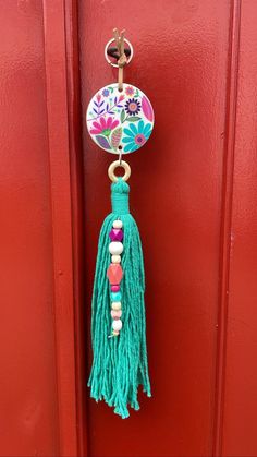 the door handle is decorated with beads and tassels