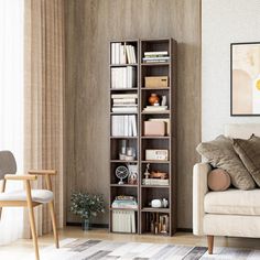 a living room with a couch, chair and bookshelf in front of a window