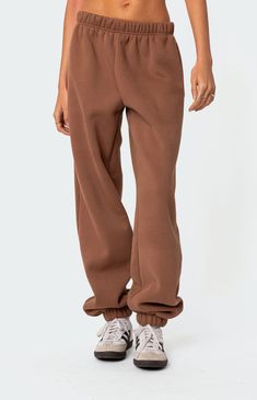 Online Only! Dive into ultimate coziness with Edikted's Clark Oversized Sweatpants. Stay on-trend with the perfect blend of comfort and style, featuring an elastic stretch waistline, oversized fit, elasticated hem, and convenient side pockets. Elevate your loungewear game and achieve maximum comfort without compromising on fashion with these must-have oversized sweatpants.   	Elastic stretch waistline 	Side pockets 	Oversized fit 	Cotton, Polyester 	Model wears size S 	Model height is 5'9 Pacsun Sweatpants, Sweatpants Oversized, Oversized Sweatpants, Visionary Fashion, Womens Clarks, Womens Loungewear, Womens Sweatpants, S Models, Model Height