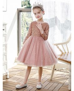 Buy pink tulle bling sequins ballgown girls formal party dress with long sleeves at wholesale price online. Free shipping and pro custom service since 2009. Toddler Girl Party Dress, Long Sleeve Tulle Pageant Dress For Wedding, Long Sleeve Tulle Ball Gown For Prom, Pink Sequined Ball Gown For Parties, Long Sleeve Tulle Tutu Dress For Pageants, Spring Long Sleeve Tutu Dress For Pageant, Tulle Long Sleeve Pageant Dress, Long Sleeve Tulle Pageant Dress, Long Sleeve Tulle Dress For Pageants