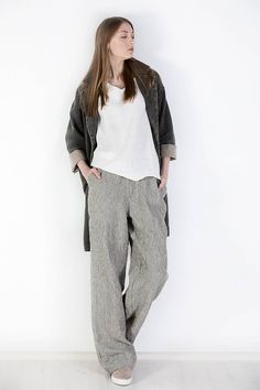 "Wide leg linen pants for a women, who always seeks to feel at her best, available in plus size. Linen pants with elastic waistband and pockets made of the organic linen fabric for your aesthetic clothing. Homemade with love and care Oeko-tex certified 100% linen loose pants which are crafted by local tailors in Lithuania (EU member). They go perfectly with any of our blouses (you will find below some recommendations)! Look sharp all day long! Pockets: side seam Waistband: elastic Details: *100% Relaxed Baggy Pants For Fall, Flax Wide-leg Pants With Pockets, Flax Tapered Leg Pants With Pockets, Linen Long Pants With Side Pockets, Relaxed Fit Flax Bottoms With Pockets, Oversized Summer Bottoms For Everyday Wear, Oversized Linen Casual Pants, Flax Colored Bottoms With Pockets, Linen Bottoms With Side Pockets For Fall