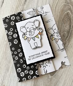 two cards with elephants on them sitting next to each other