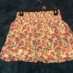 Brand New With Tags. Mini Elastic Waist . Floral Print Skirted Skort For Beach, Beach Mini Skirt With Lining, Casual High Waist Skirt With Floral Print, Casual High-waist Skirt With Floral Print, Casual High Waist Floral Print Skirt, Casual High-waisted Floral Print Skirt, Floral Print Mini Skirt For Summer Beach, Pleated Skirt Skort For Vacation In Spring, Pleated Skort For Vacation In Spring