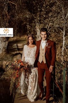 a bride and groom walking down a path in the woods