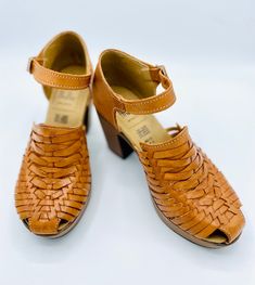 Handmade with intricate woven leather, these strap high heel huaraches are comfortable, classic, and cute! A versatile look that can be dressed up or dressed down, you'll love the stability and practicality of this timeless shoe. Genuine Leather Honey Tan Handmade in Mexico Pro-tip! These naturally run large so if you order a size 7, you will be receiving a size 6. Trust us, it will fit like a 7! Which means if you are a half size, size down. For example, if you are a 7.5 a size 7 should fit you Woven Leather Block Heels, Brown Heels With Adjustable Ankle Strap, Adjustable Brown Ankle Strap Heels, Brown Adjustable Ankle Strap Heels, Casual High Heel Woven Leather Heels, Casual Woven Leather High Heels, Woven Leather Sandals With Block Heel, Brown Synthetic Heels With Woven Leather, Casual Sandals With Woven Leather And Block Heel