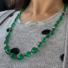 "DESCRIPTION: Thank you for coming in! Breath-taking Zambian emerald in the most beautiful and vibrant blue green color and with gem clarity which give it a glowing look you can only find in the best material! Decorated with the finest ruby rondelles and diamond accent! Made with 18k yellow gold and diamond findings! These are treasures you can collect and pass down through generations! Emeralds are even more valuable than diamonds because pure Emerald is very rare and is out numbered greatly by Exquisite Green Jewelry With Gemstone Accents, Green Multi-stone Round Necklace, Luxury Faceted Green Necklace, Green Emerald Necklace For Jewelry Making, Luxury Green Faceted Necklaces, Fine Jewelry Green Necklaces With Gemstone Accents, Luxury Green Faceted Necklace, Green Multi-stone Round Necklaces, Green Briolette Emerald Necklace For Formal Occasions