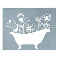 a bathtub with flowers in it on a blue background