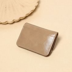 Our wallet boasts a sleek and refined look, perfect for both casual and formal settings. The vintage lock adds a unique, stylish touch that stands out. Fabric: PUsize:12*2*8cmWeight:0.05kg Elegant Compact Everyday Wallet, Retro Compact Wallet For Everyday Use, Elegant Compact Leather Wallet, Compact Vintage Travel Wallet, Vintage Compact Wallet For Daily Use, Mini Wallet, The Vintage, Solid Color, Twist