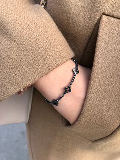 "This delicate and dainty bracelet is made of Genuine black Hematite. Bracelet looks very beautiful, unusual and just perfect for everyday wear as for special occasions. Cloverleaf is well known as a symbol of St. Patrick's Day, shamrock clover mean hope, faith, luck, and love. . ❗️Sign up to our Newsletter and get 15% OFF your order (copy this link to browser search) - https://forms.gle/R74xLdL1MSmC9Apn6 ❗️ . 🔸 MEASUREMENTS🔸 ▪️ Gemstones: Hematite ▪️ Beads size: 2 mm, 6 mm (Cloverleaf) ▪️ Cla Elegant Black Chain Bracelet With Adjustable Chain, Elegant Black Bracelets For Everyday, Elegant Black Adjustable Chain Bracelet, Elegant Black Bracelet With Adjustable Chain, Elegant Black Chain Bracelet As Gift, Elegant Black Bangle Charm Bracelet, Minimalist Black Chain Bracelet, Elegant Black Beaded Bracelet With Adjustable Chain, Elegant Black Metal Chain Bracelet