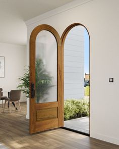 an open door leading to a dining room