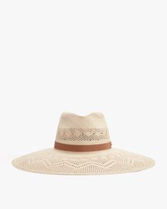 Wide-brimmed hat with perforated pattern and a ribbon band. Open Weave Flat Brim Straw Hat For Beach, Flat Brim Open Weave Straw Hat For Beach, Beach Straw Hat With Flat Brim And Open Weave, Adjustable Open Weave Sun Hat In Toquilla Straw, Beige Woven Straw Hat With Curved Brim, Open Weave Straw Sun Hat With Flat Brim, Straw Open Weave Sun Hat With Flat Brim, Open Weave Flat Brim Straw Sun Hat, Adjustable Open Weave Straw Hat