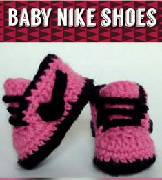 a pair of pink and black crocheted shoes with the words baby nikes on it