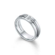 a white gold ring with diamonds on it