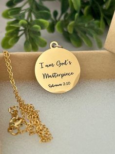 A beautiful disc gold necklace engraved with "I am God's Masterpiece". Necklace is 18" adjustable 16K Gold Plated Dainty chain. Great women's gift, Baptism, affirmation, motivational. Charms are gold plated over stainless steel. Plated jewelry is a wonderful, affordable way to add a sophisticated look to your wardrobe, with the look of real gold. It is also an excellent choice for people with sensitive skin. CARE TIPS: Avoid contact with perfumes, body oils, and other chemicals, including househ Spiritual Gold Charm Necklaces For Birthday Gift, Spiritual Gold Charm Necklace For Birthday Gift, Spiritual Adjustable Coin Necklace For Gift, Spiritual Adjustable Coin Necklace As Gift, Inspirational Personalized Gold Jewelry, Gold Engraved Charm Necklace For Birthday, Spiritual Coin Necklace With Adjustable Chain, Spiritual Coin Necklace With Adjustable Chain As Gift, Gold Medallion Necklaces With Engraving Option