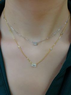 1.This beautiful simulated diamond necklace which is made of cubic zirconia.It is the most popular choice for affordable luxury.  2.Easily match with other jewelries;   3.It is an ideal gift for Girlfriend,Daughter,Lover, Mom,Sister,Bride,Bridesmaids, Aunt, Friend etc, expressing your warmhearted blessing; 4.This necklace for women is a great way to show how much you care. It looks like a diamond necklace. Material: Sterling Silver,14K Gold Plated,Rhodium,Cubic Zirconia Weight: 2.1g     Pendant Diamond White Cubic Zirconia Necklace With Sparkling Stones, Rhinestone Cubic Zirconia Necklace As Gift, Dainty Cubic Zirconia Diamond Necklace As Gift, Delicate Cubic Zirconia Chain Necklace For Gift, Dazzling Cubic Zirconia Rhinestone Necklace For Anniversary, Dazzling Cubic Zirconia Diamond Necklace, Dainty Cubic Zirconia Necklace With Diamond Accents, Fine Jewelry Cubic Zirconia Necklace In Diamond White, Dazzling Diamond Necklace With Sparkling Stones For Gift