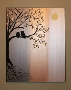 two birds sitting on top of a tree in front of a sun and clouds painted on the wall