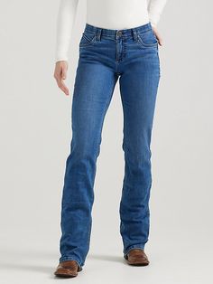 RIDING JEANS THAT NEVER QUIT Feel confident and comfortable in your riding clothes by giving yourself the best seat possible. Wrangler® women's Ultimate Riding Jeans are designed for fit, form, and function while on horseback, but they are bound to become your go-to jeans for working in the barn and running errands around town. Q-Baby women's jeans feature a mid-rise fit and no-gap waistband for full coverage when you're in the saddle as well as added stretch and flat seams for all-day comfort. Riding Jeans, Riding Clothes, Never Quit, Baby Jeans, Womens Jeans Bootcut, On Horseback, Riding Outfit, Wrangler Jeans, The Barn